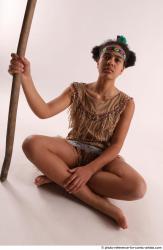 ANISE SITTING POSE WITH SPEAR